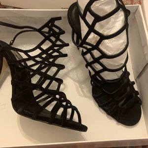 Black caged Steve Madden Slithur heels, size 9.5